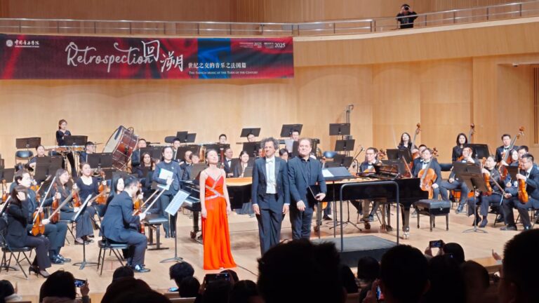 Enrico Elisi, Mengyang Pan and Manuel Nawri bow for a standing ovation in the Guoyintang Concert Hall.