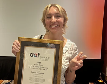 Peyten Woodruff holds her AAF award