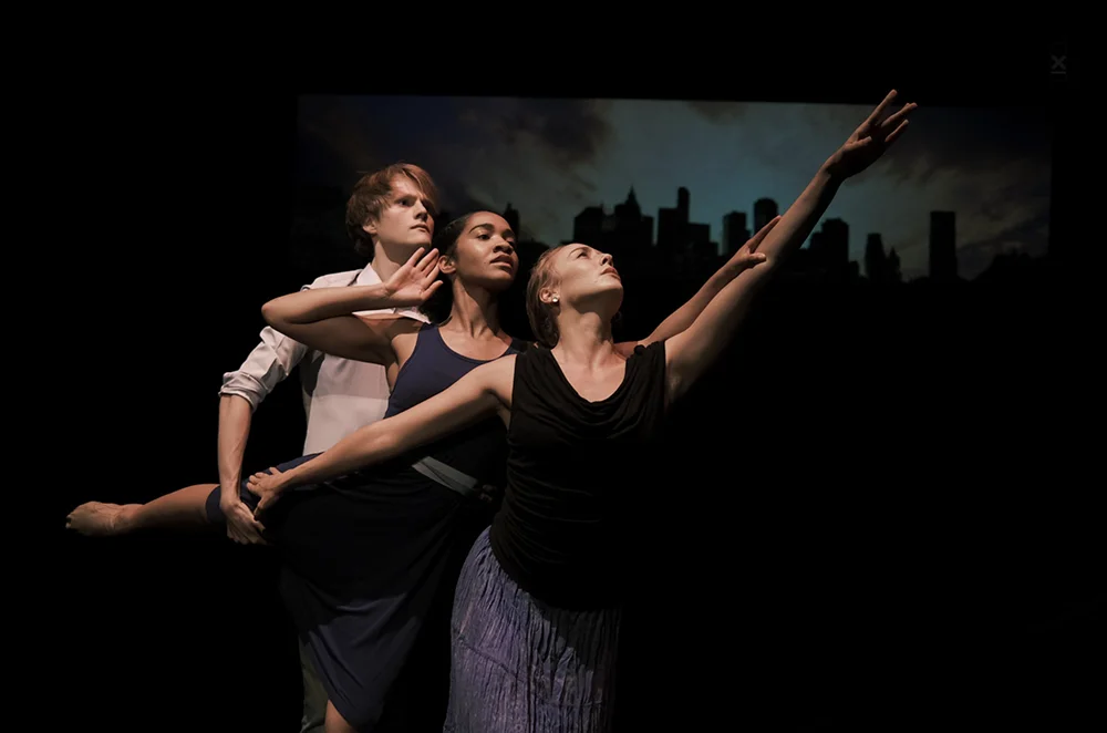 Three dancers perform a scene from Sh'ma