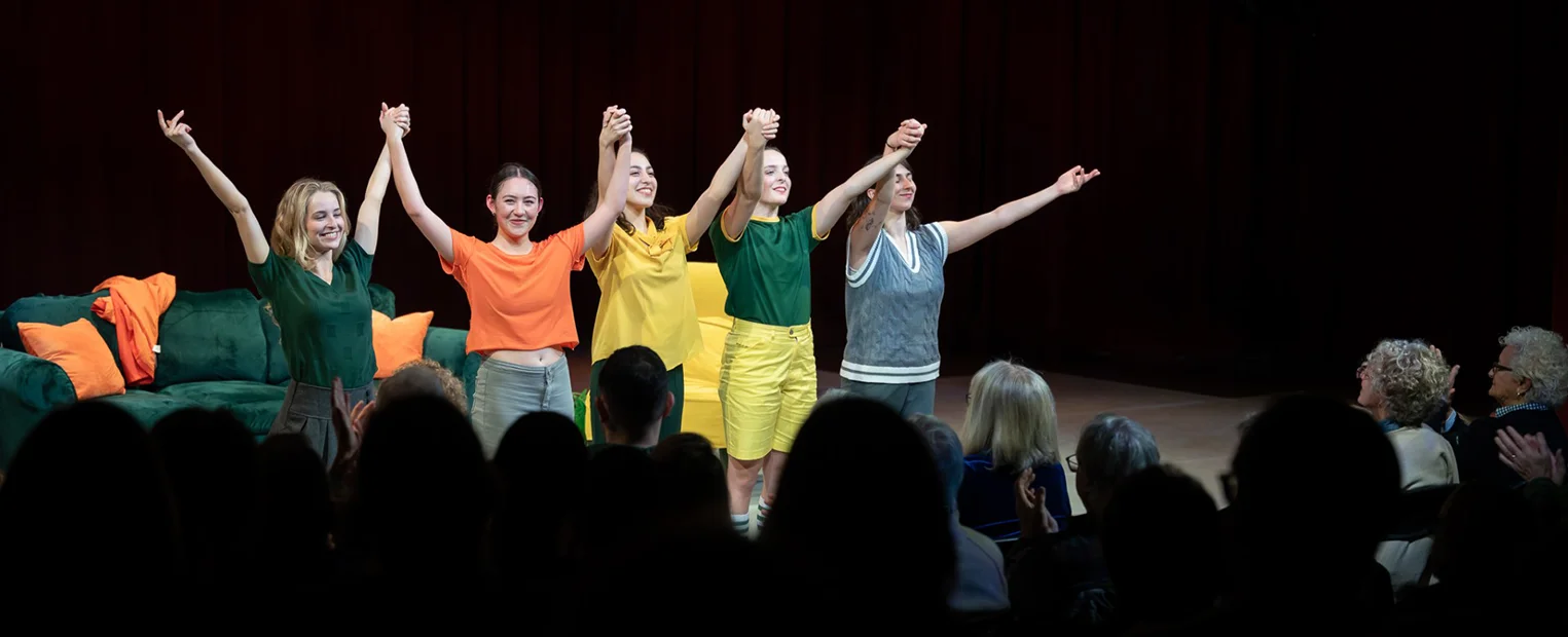 Meghan and four other performers take a bow on-stage